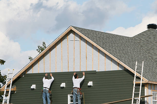 Professional Siding Replacement technician working in Lexington, IL